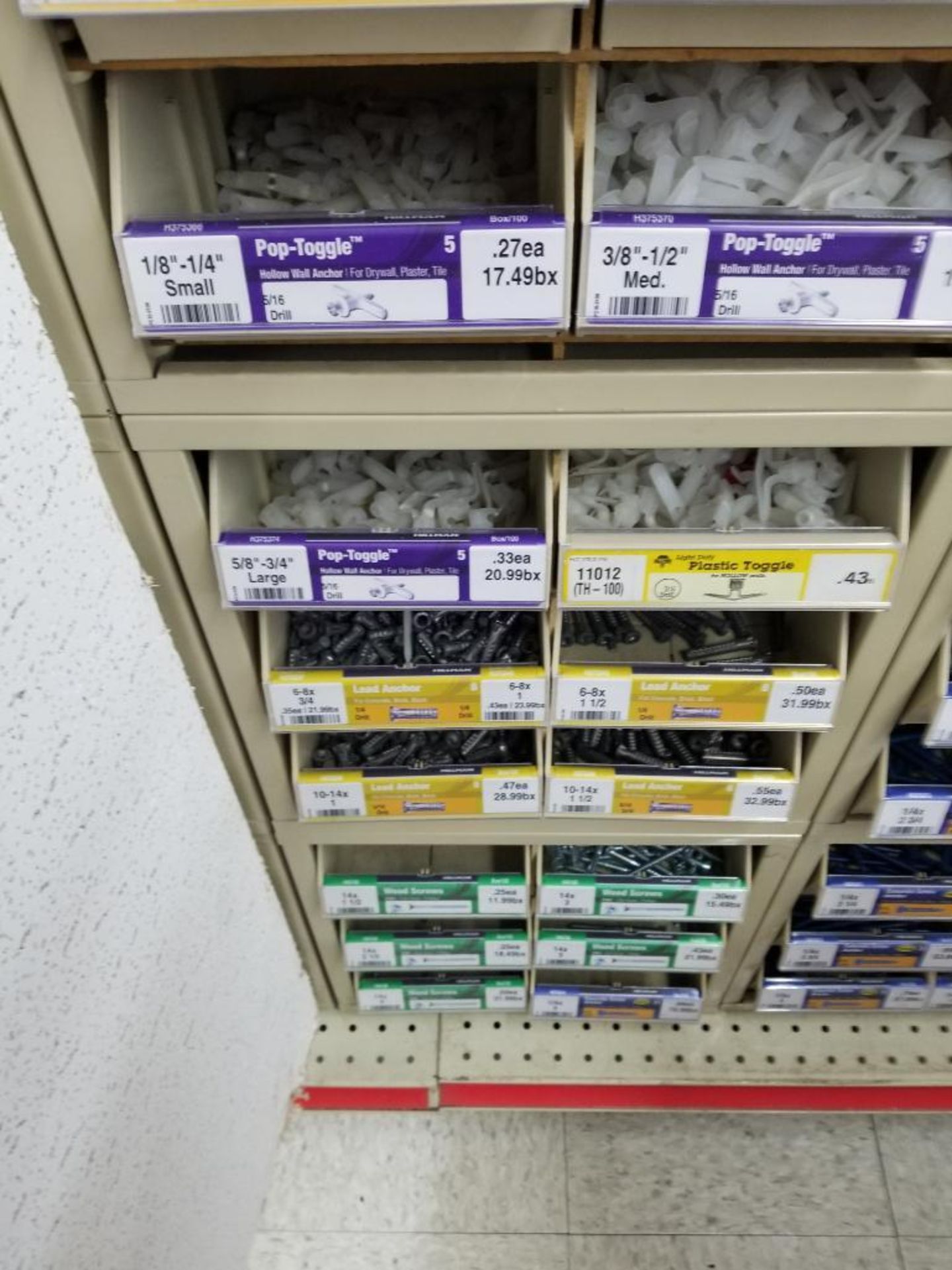 Full column section of bolt fastener display with bins, contents in bins and on top. - Image 3 of 12