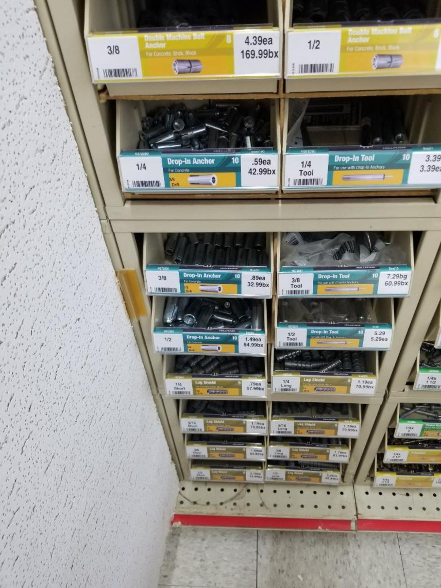 Full column section of bolt fastener display with bins, contents in bins and on top. - Image 2 of 16