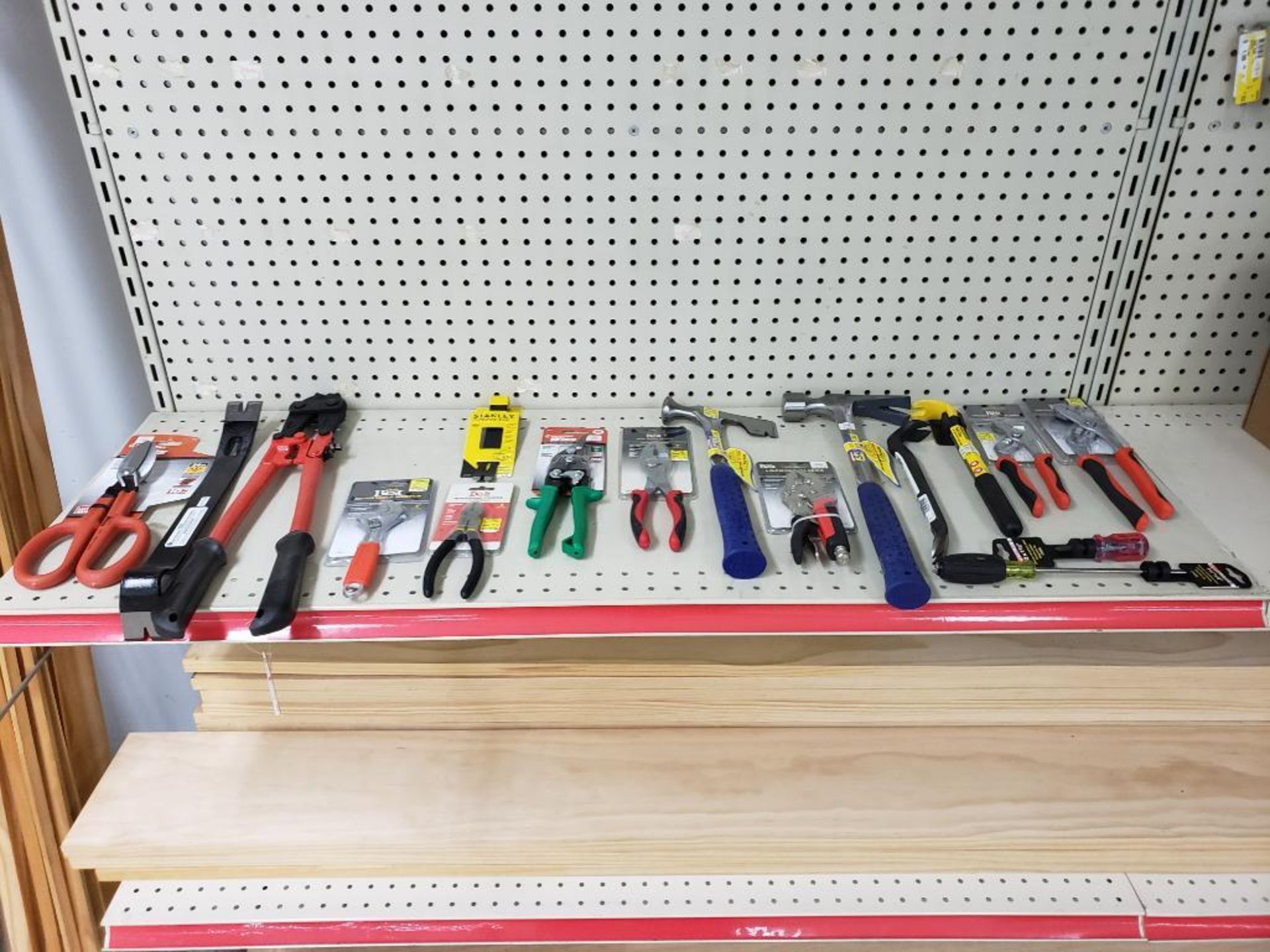 Large assortment of tools. Hammers, prybars, snips, plyers, and more! New as pictured.