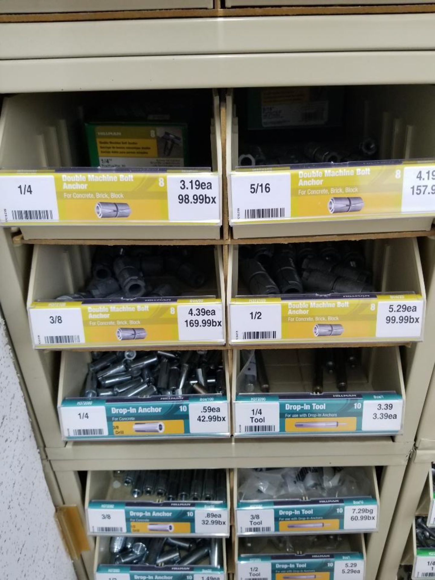 Full column section of bolt fastener display with bins, contents in bins and on top. - Image 10 of 16