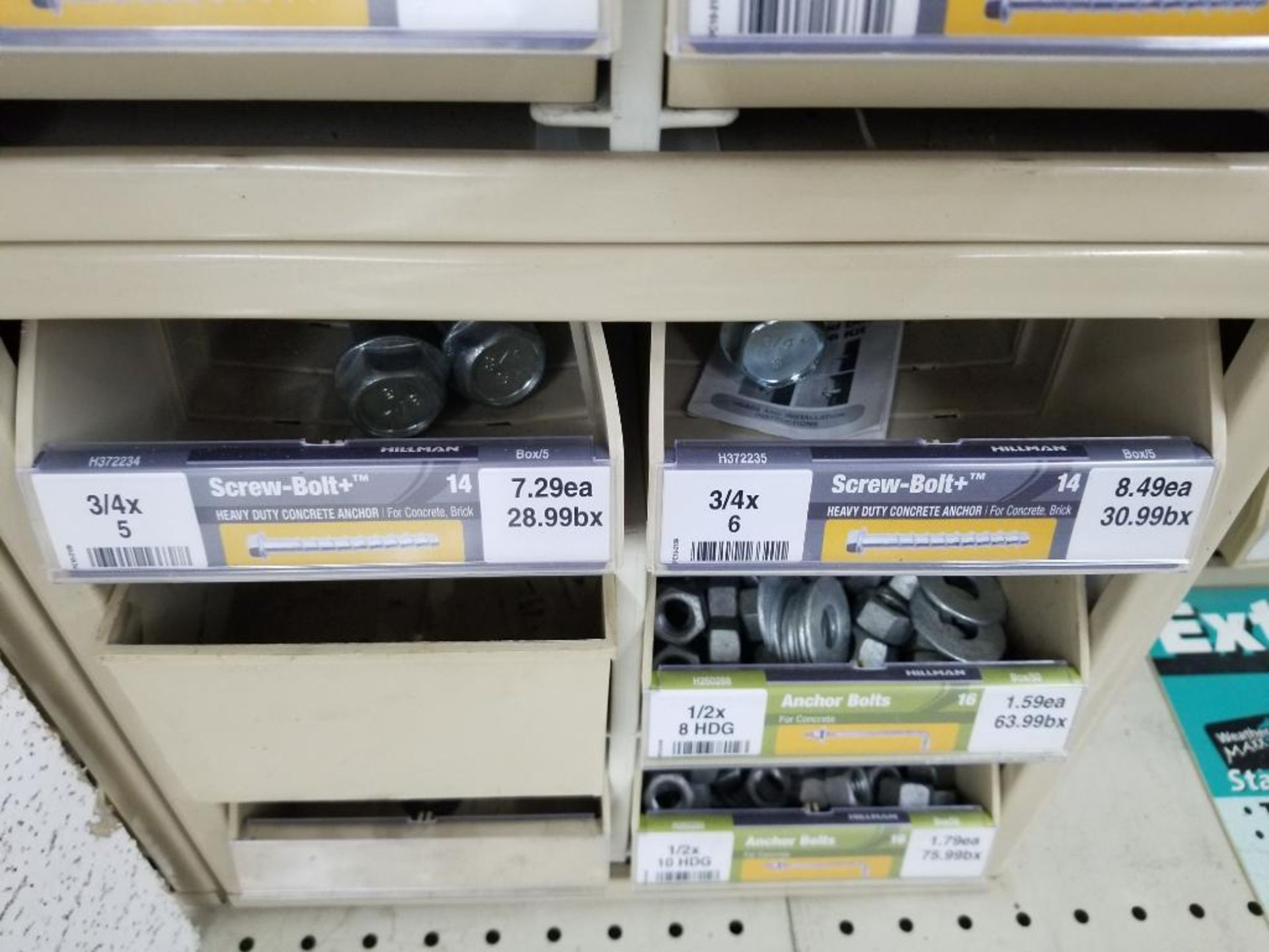 Full column section of bolt fastener display with bins and contents in bins and on top. - Image 5 of 9