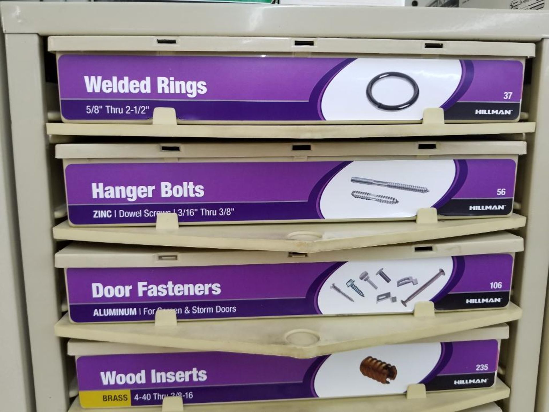 Full column section of bolt fastener display with bins, contents in bins and on top. - Image 5 of 10