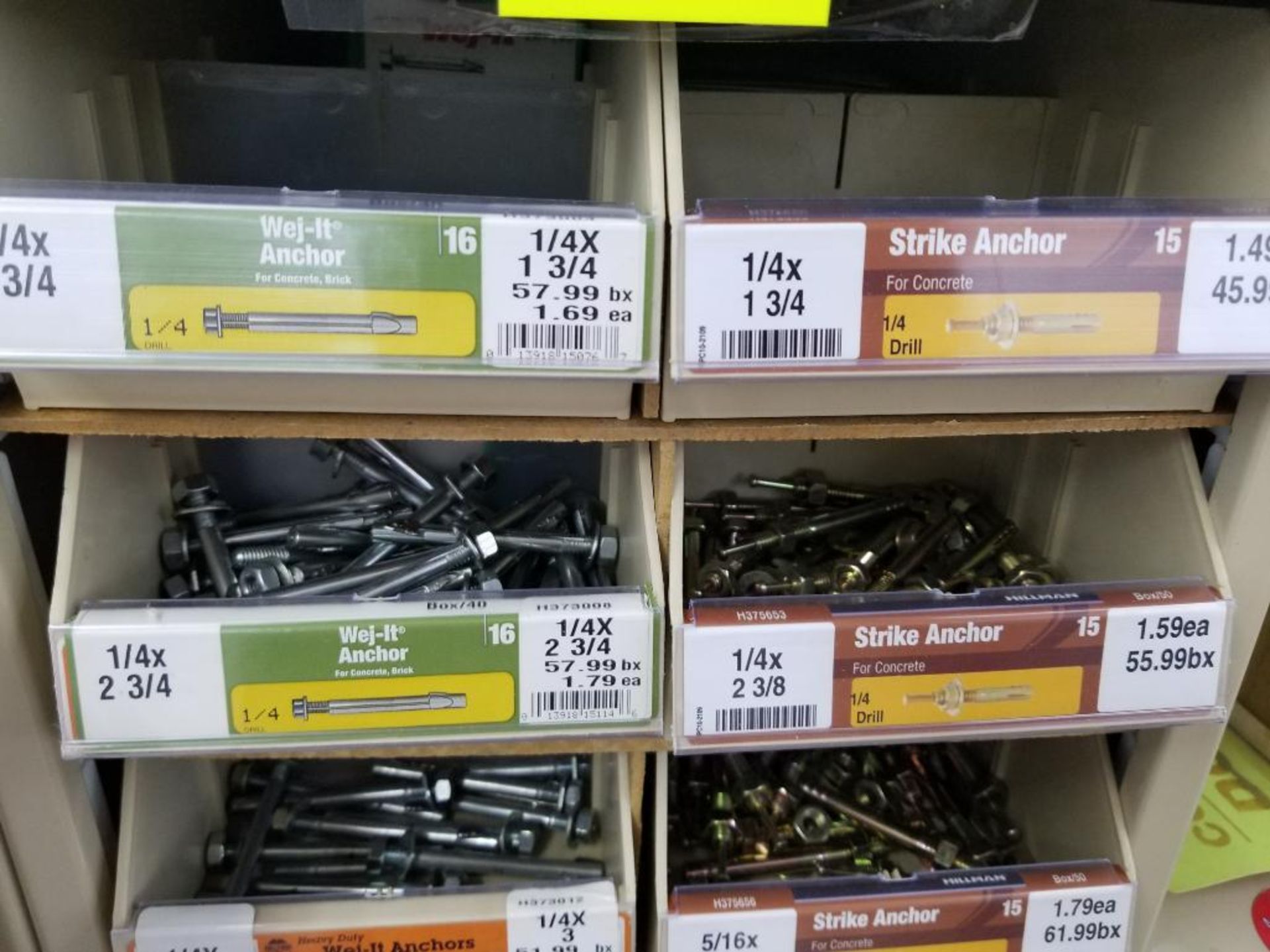 Full column section of bolt fastener display with bins and contents in bins and on top. - Image 6 of 12