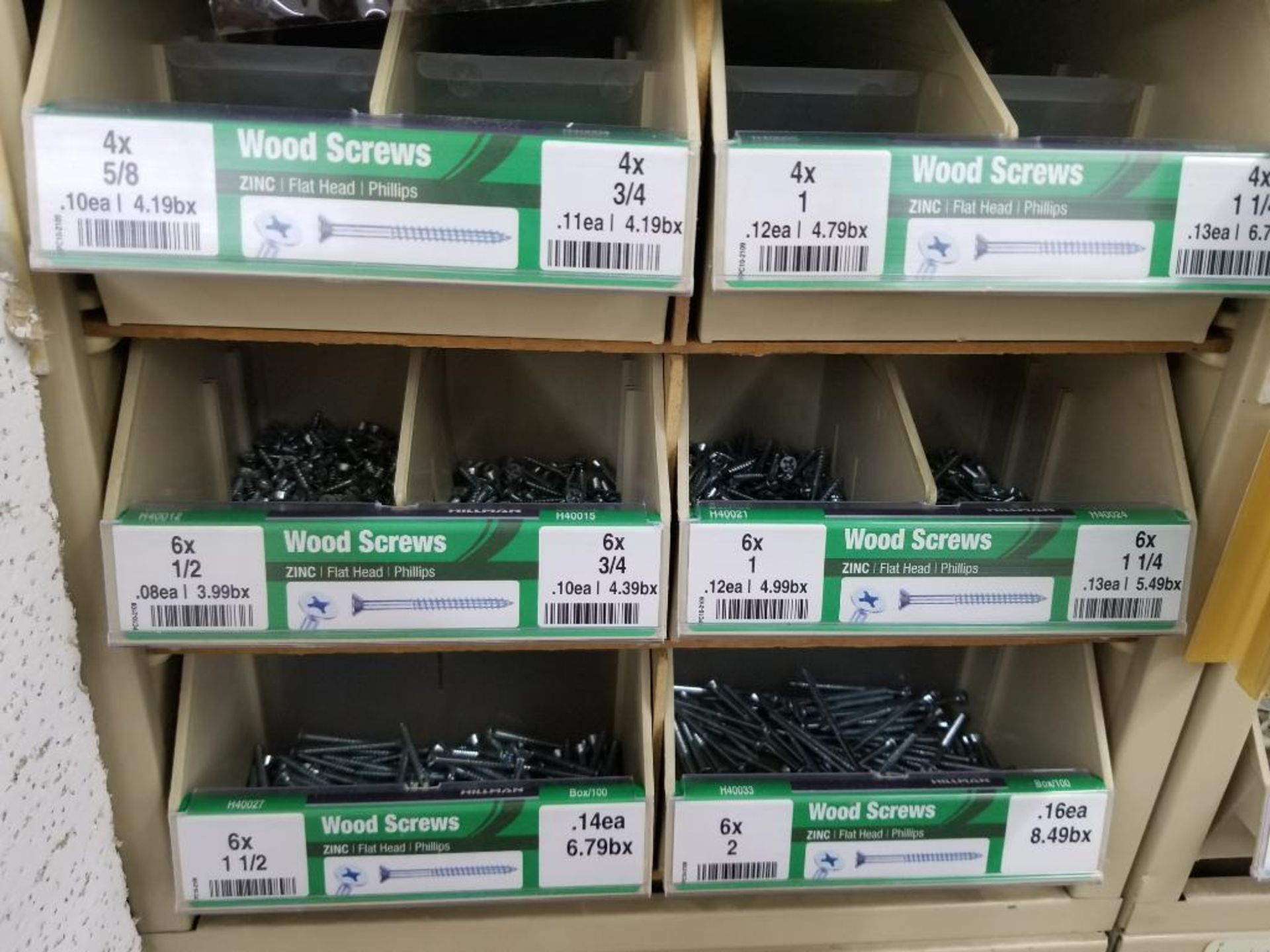 Full column section of bolt fastener display with bins, contents in bins and on top. - Image 6 of 9