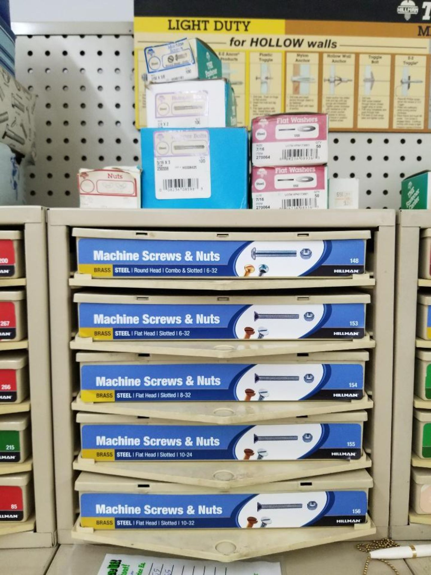 Full column section of bolt fastener display with bins, contents in bins and on top. - Image 4 of 11