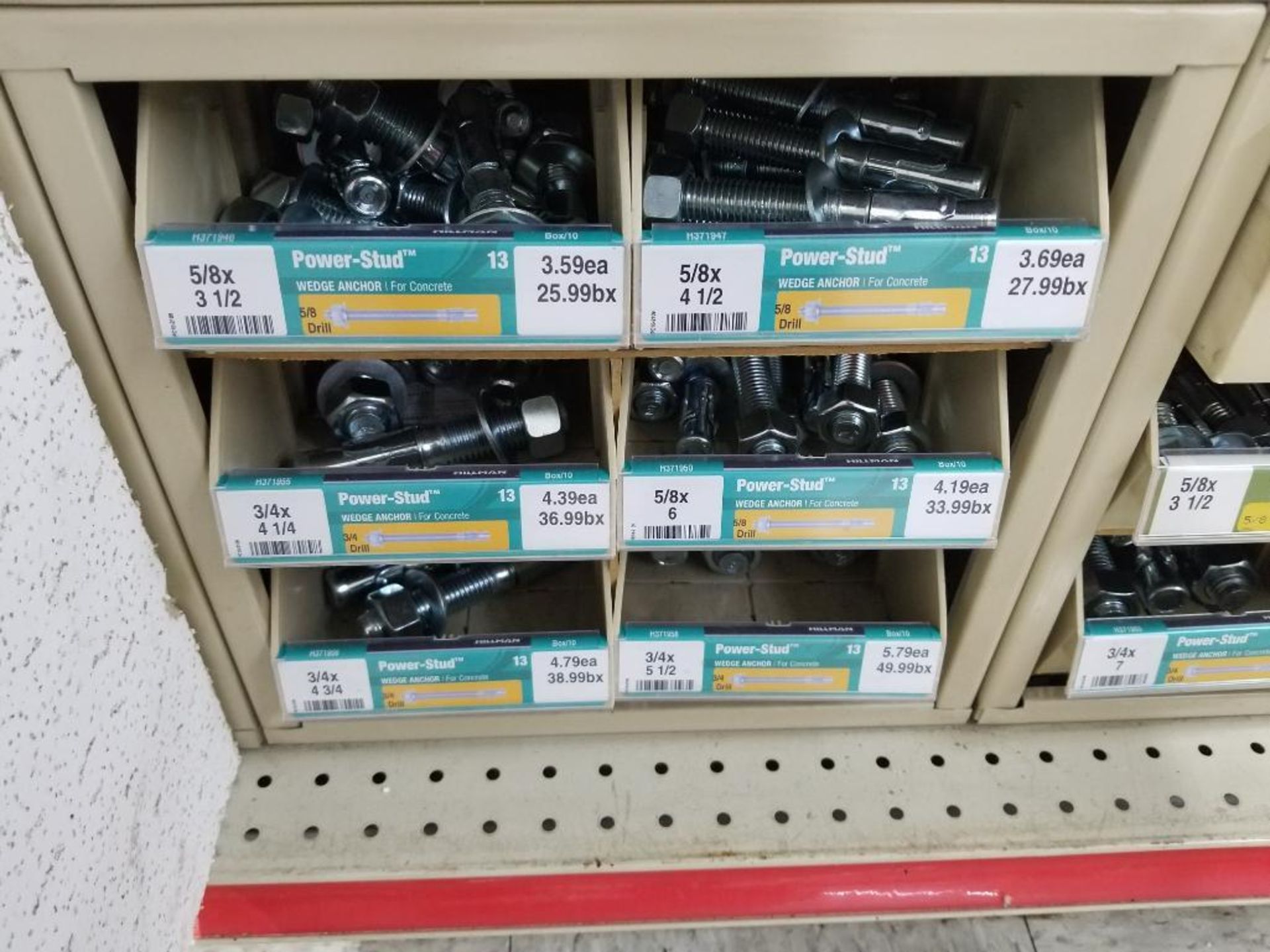 Full column section of bolt fastener display with bins, contents in bins and on top. - Image 10 of 10