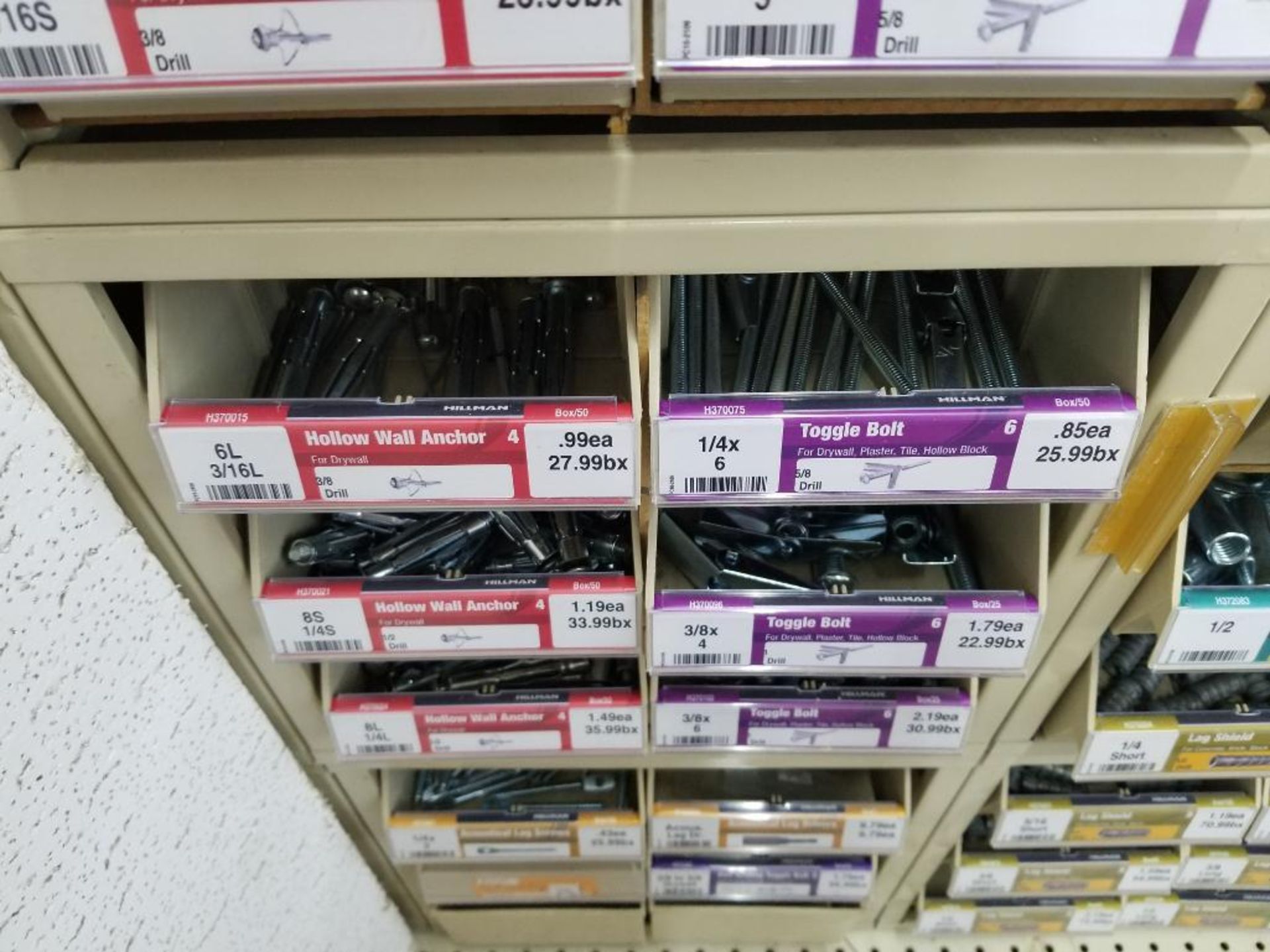 Full column section of bolt fastener display with bins, contents in bins and on top. - Image 10 of 13