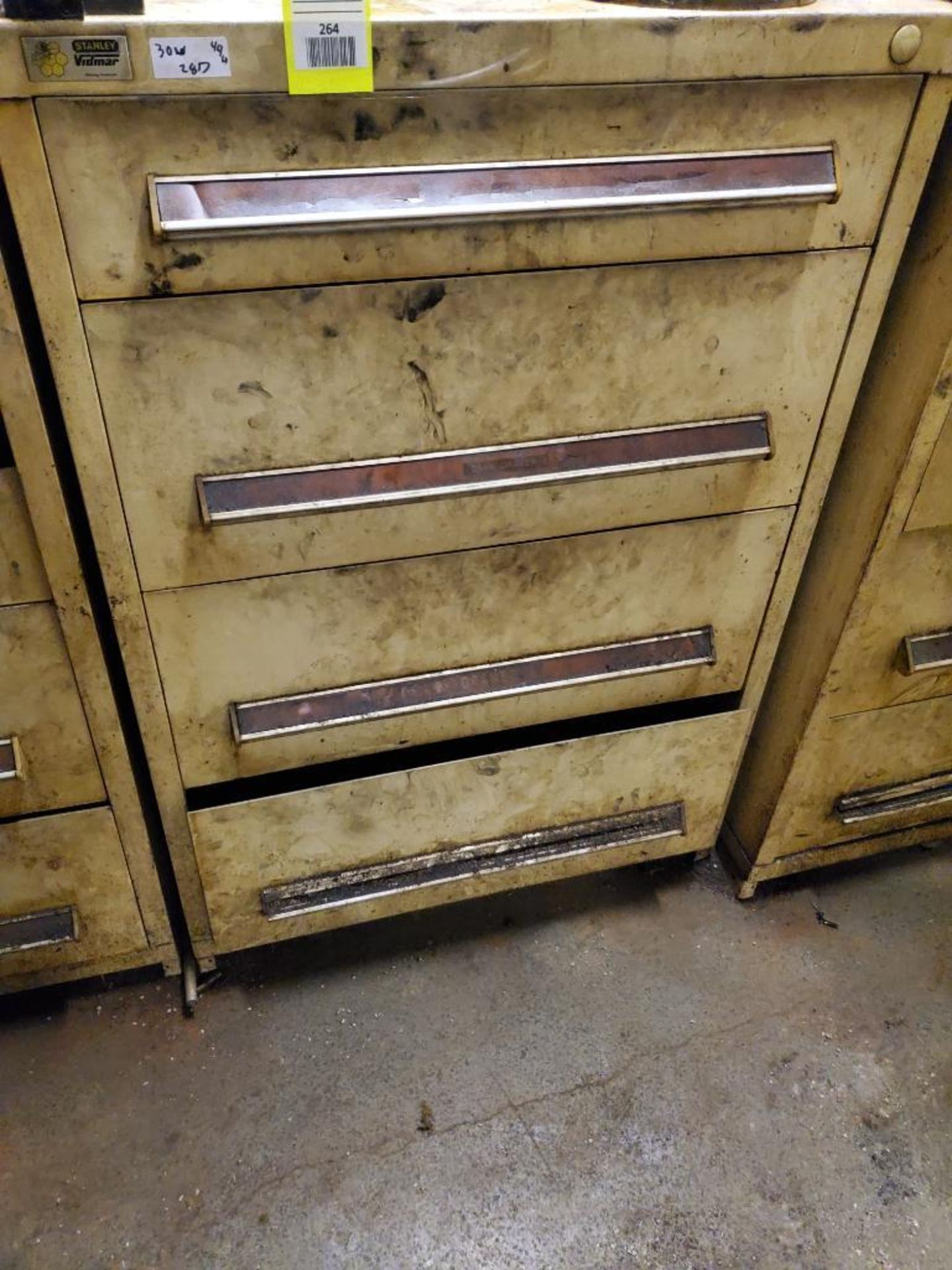 4 drawer Stanley Vidmar 44 tall x 30w x 28d. Contents not included.