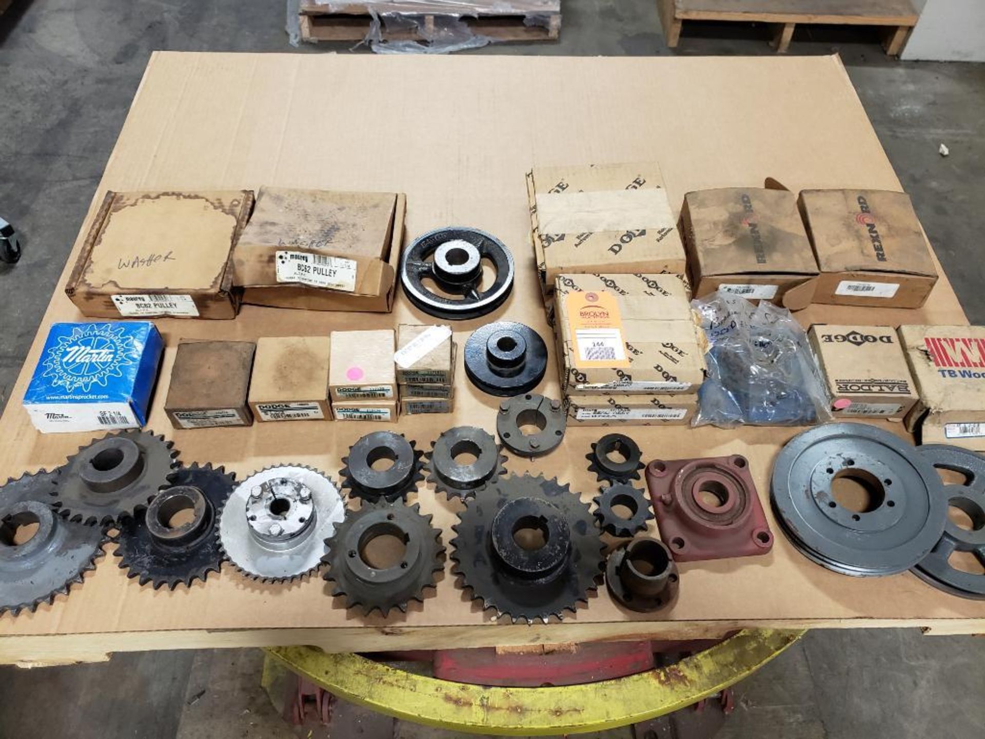 Assorted gears, pullys, and bushings. TB Woods, Dodge, Martin.