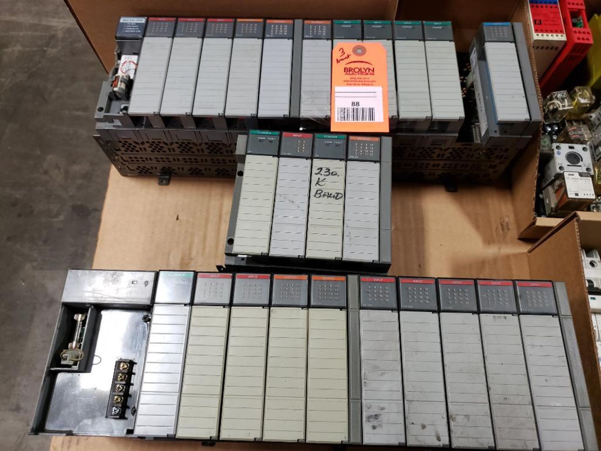 Qty 3 - Assorted Allen Bradley SLC control racks. 5/01 CPU, Scanner, and I/O units.