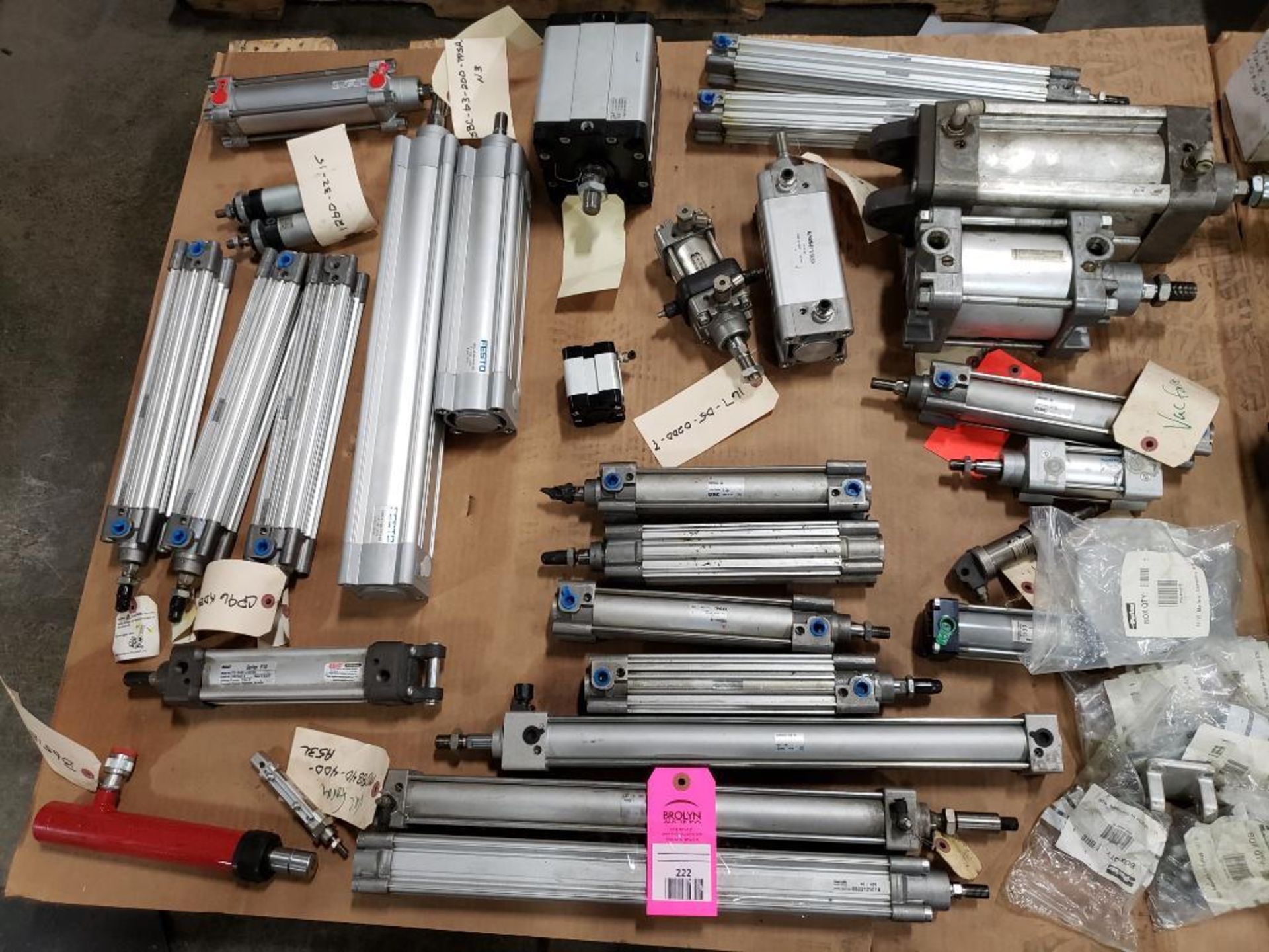 Pallet of assorted pneumatic cylinders. SMC, Festo.