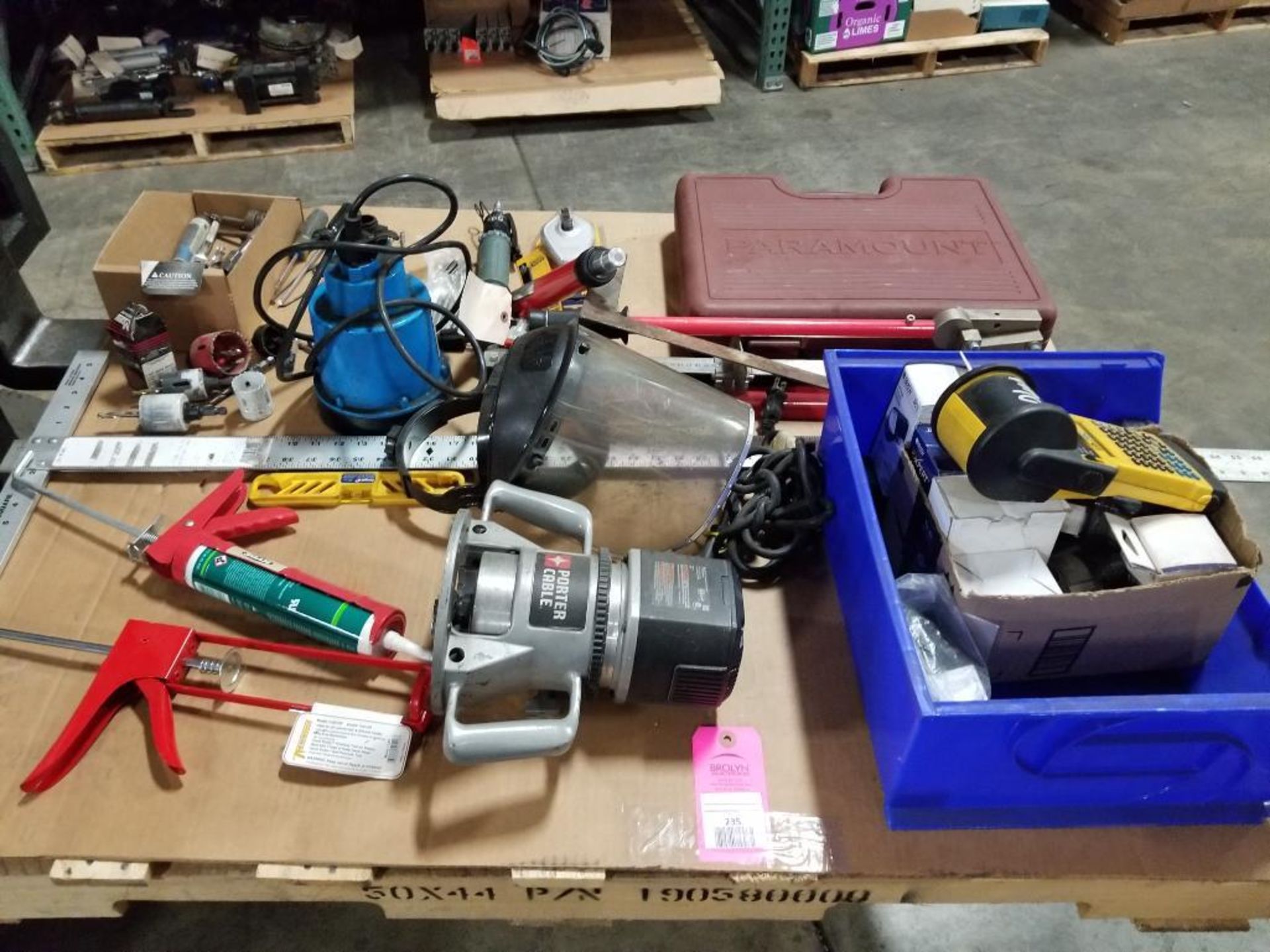 Pallet of assorted tools, label maker, pump. Simer, Porter Cable, Brady.