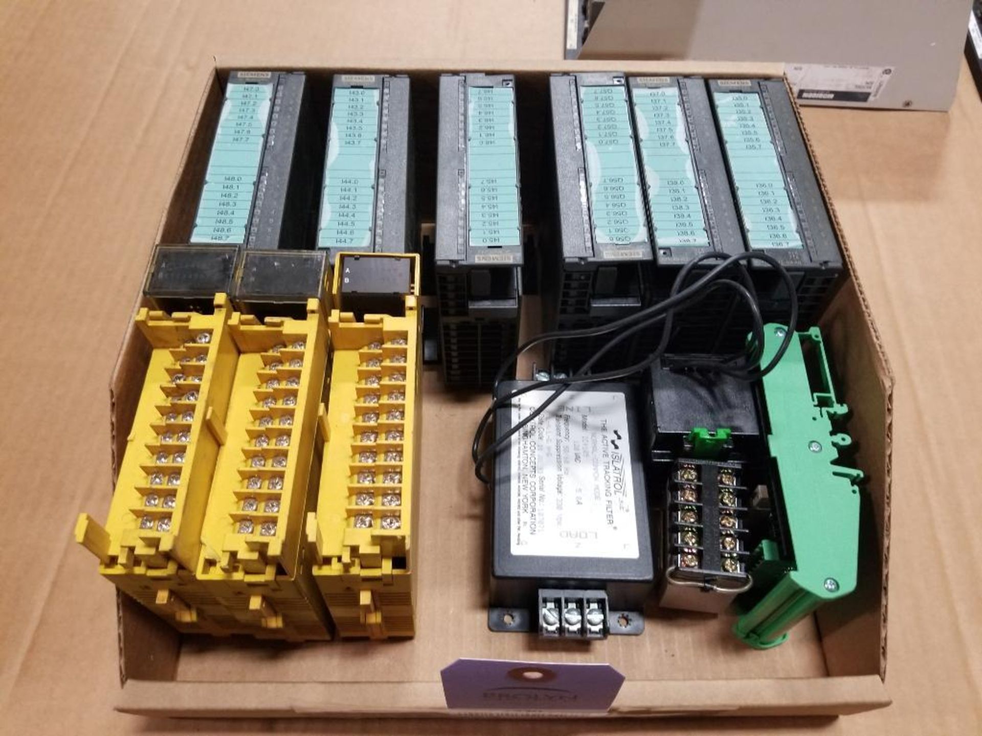 Assorted electrical modules, relays, line filter. Siemens, Fanuc.