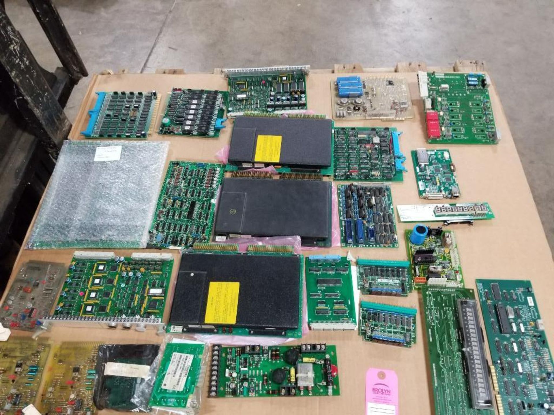 Pallet of assorted electrical control boards.