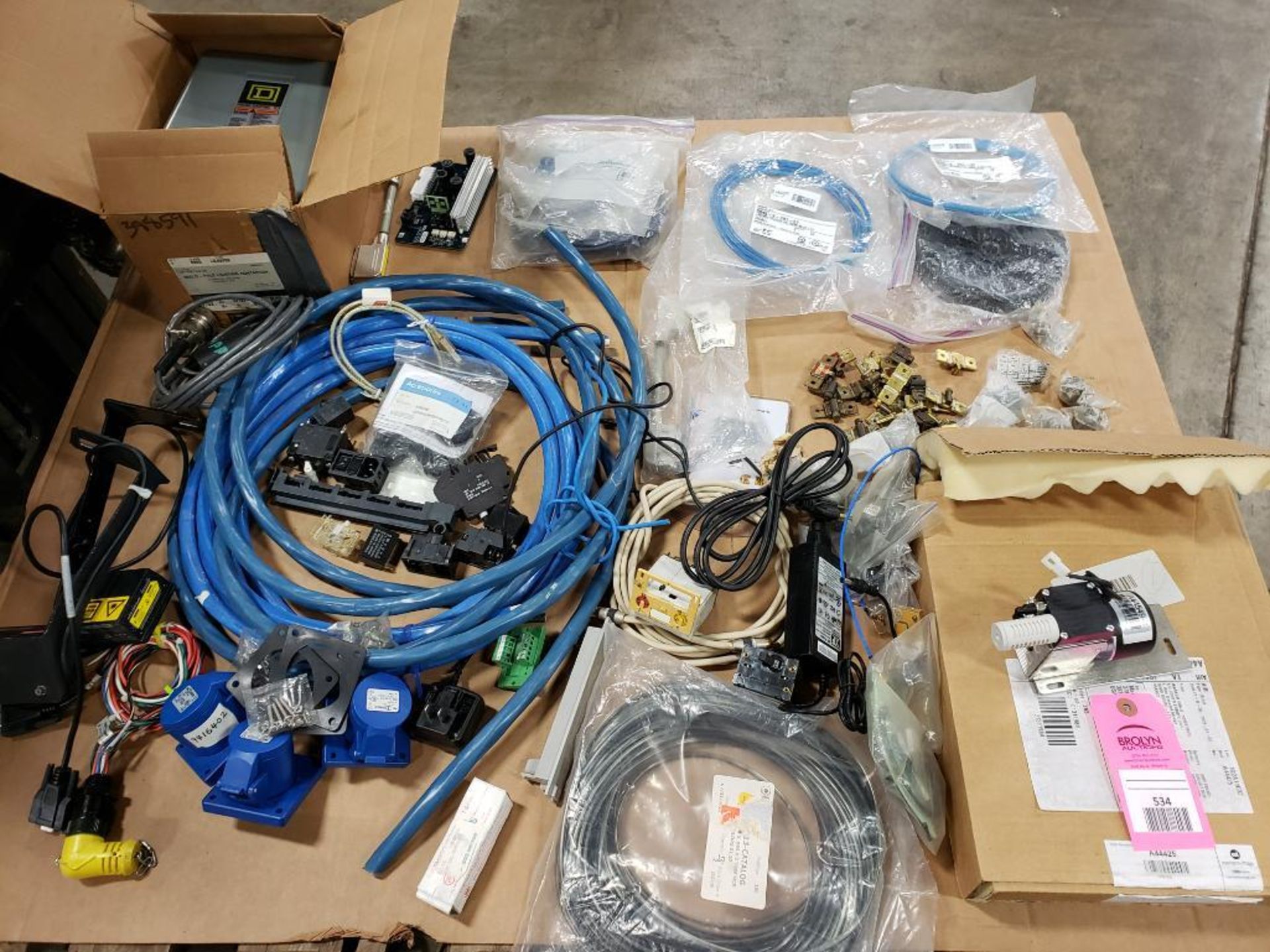 Pallet of Assorted electrical and flow control. Pump, relays, plugs.