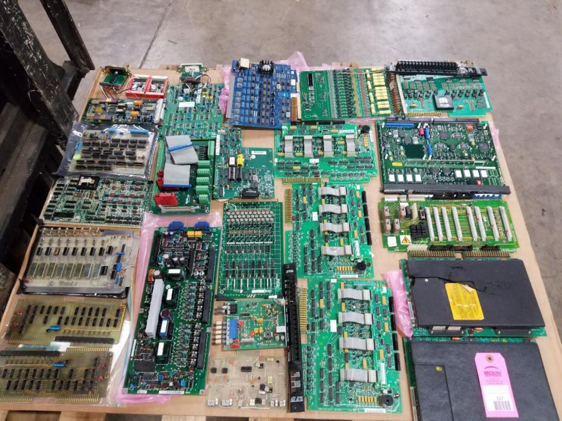 Pallet of assorted electrical control boards.