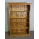 A pine open bookcase, modern, with adjustable shelving