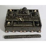 A fine Anglo Ceylonese ebony and bone dot writing stand, mid 19th century, possibly Matara, of