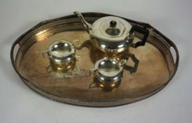 An Edwardian silver tea set, Birmingham 1825, comprising of a tea pot of compressed form with