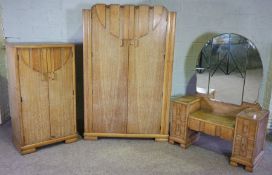 An Art Deco limed oak 3 piece bedroom suite, comprising a double wardrobe, 185cm high, 120cm wide,