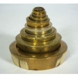 A graduated set of nine brass Imperial weights, largest 4lbs, smallest 1/4 oz. (9)