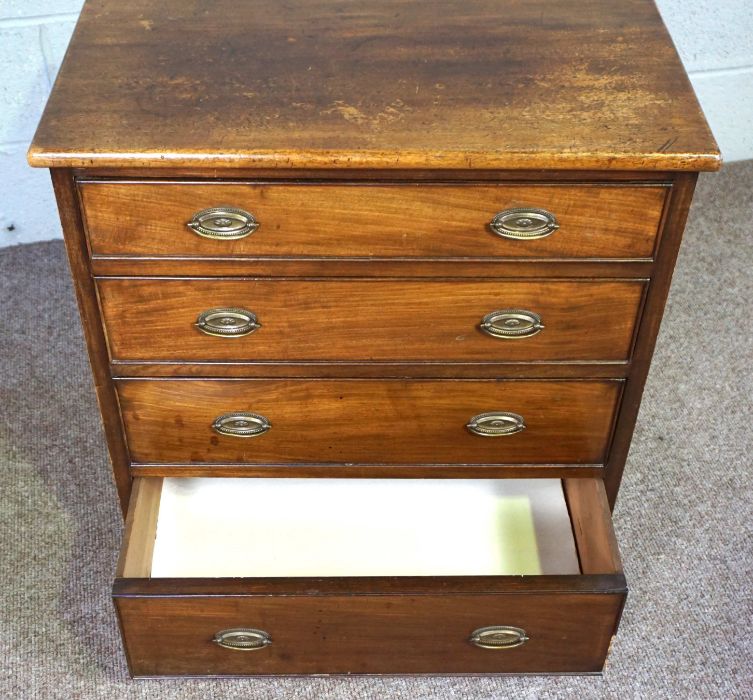 A small mahogany chest of drawers, 19th century, with four long drawers, on compressed bun feet, - Image 6 of 9