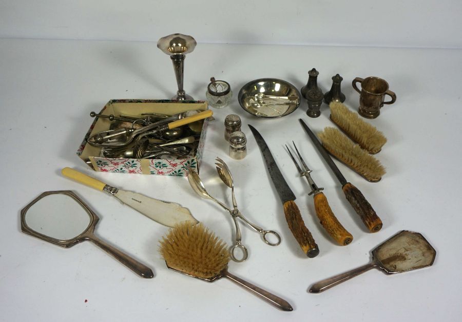 Assortment of silver and silver plate including a horn handled carving set, assorted condiments, a