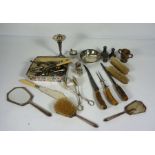 Assortment of silver and silver plate including a horn handled carving set, assorted condiments, a