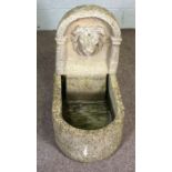 Lion headed fountain, composition stone, 20th century, 68cm high, 64cm long