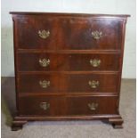 A George II style chest of drawers, early 20th century, with drop front top drawer and three further