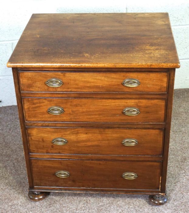 A small mahogany chest of drawers, 19th century, with four long drawers, on compressed bun feet, - Image 2 of 9