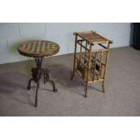 A Victorian games table, with circular chequer board top on cast iron base, 69cm high, 48cm