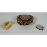 Three vinaigrettes, including an antler mounted piece, a Victorian silver vinaigrette, and an