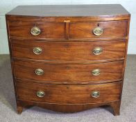 An early Victorian mahogany bowfront chest of drawers, circa 1840, with two short and three long