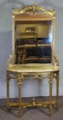 An 18th century style gilt wood framed console table and integral mirror, 20th century reproduction,