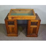 A pair of Edwardian desk pedestals, together with a table top vitrine cabinet (3)