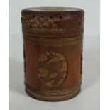 A Chinese bamboo box, Late Qing Dynasty or early Republic period, of canister form, carved