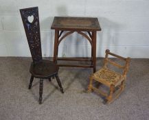 A carved spinning chair, 19th century; together with a small child's rocking chair, and an