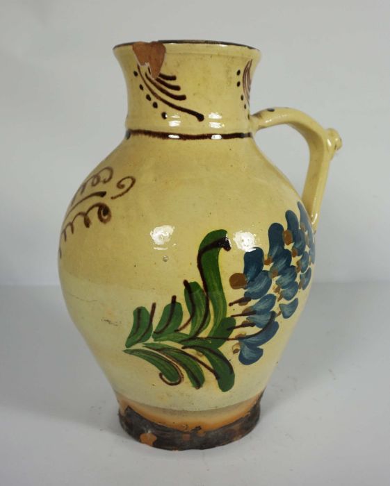 An English slipware puzzle jug, probably West Country, 19th century, decorated with leaves on a - Image 2 of 3