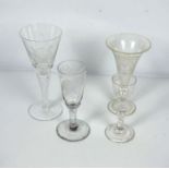 Four glasses, including a cordial glass, a 1970’s presentation air twist goblet, inscribed York,