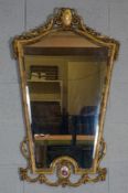 An 18th century style gilt framed wall mirror, 95cm x 58cm