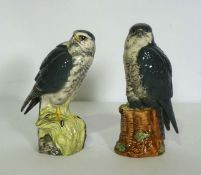 A pair of Royal Doulton ceramic decanters, in the form of Birds of Prey, filled by Beneagles Whisky,