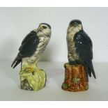 A pair of Royal Doulton ceramic decanters, in the form of Birds of Prey, filled by Beneagles Whisky,