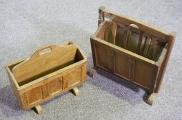 Two joined oak magazine stands, each with panelled sides, 20th century, one 40cm high, 45cm wide,