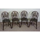 A set of four beech kitchen wheel backed chairs, modern (4)