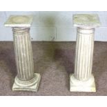 Two composition stone Doric plinth, 70cm high, Modern