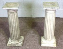 Two composition stone Doric plinth, 70cm high, Modern