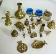 A large assortment of small brassware objects, including a model spitfire; together with a model