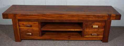 A modern heavy hardwood side table, with deep planked top, over two shelves and four short