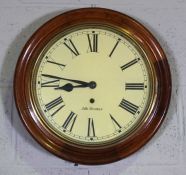 An American Wall Clock, signed Seth Thomas, in Victorian railway style, with circular moulded case